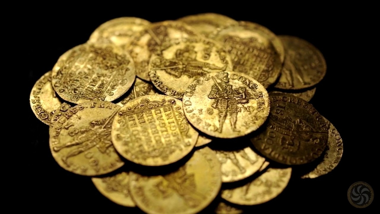 испанские золотые монеты. настоящие золотые монеты. старинные золотые монеты. настоящие золотые монеты. коллекция золотых монет.